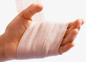 Hand Being Bandaged After A Small Injury