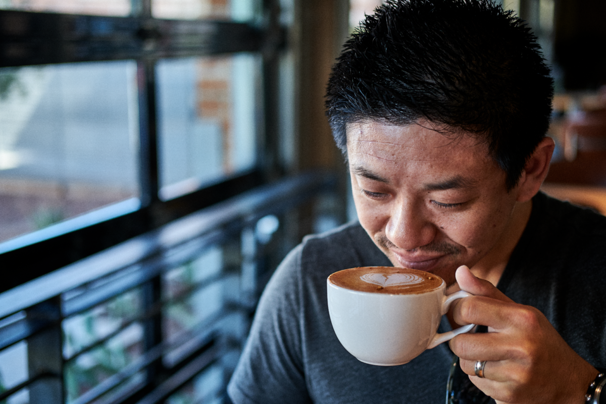 Ben Fung enjoying coffee drink 